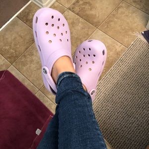 lavender crocs on feet